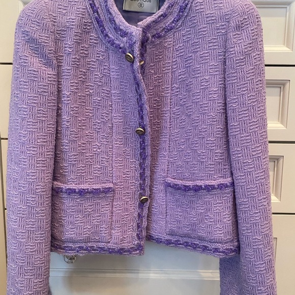 Gorgeous lavender Chanel jacket and skirt!